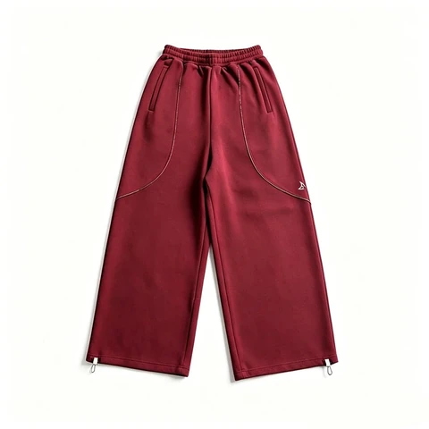 Burgundy wide-leg sweatpants on a white background